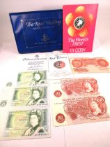 Interesting Numismatic lot to include Three near mint one pound notes, two with consecutive numbers,