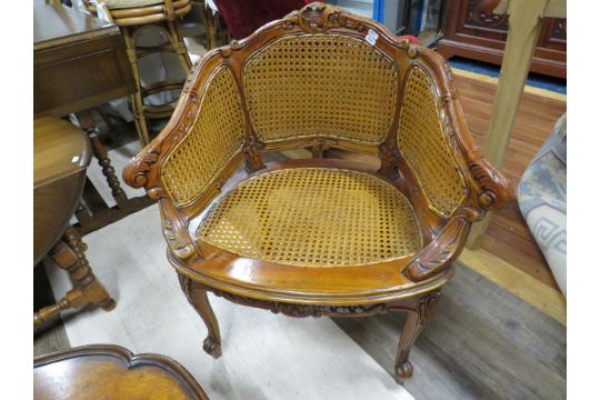 Nicely Carved Vintage Bergere tub chair together with a small vintage circular table. See photos.  - Image 2 of 3