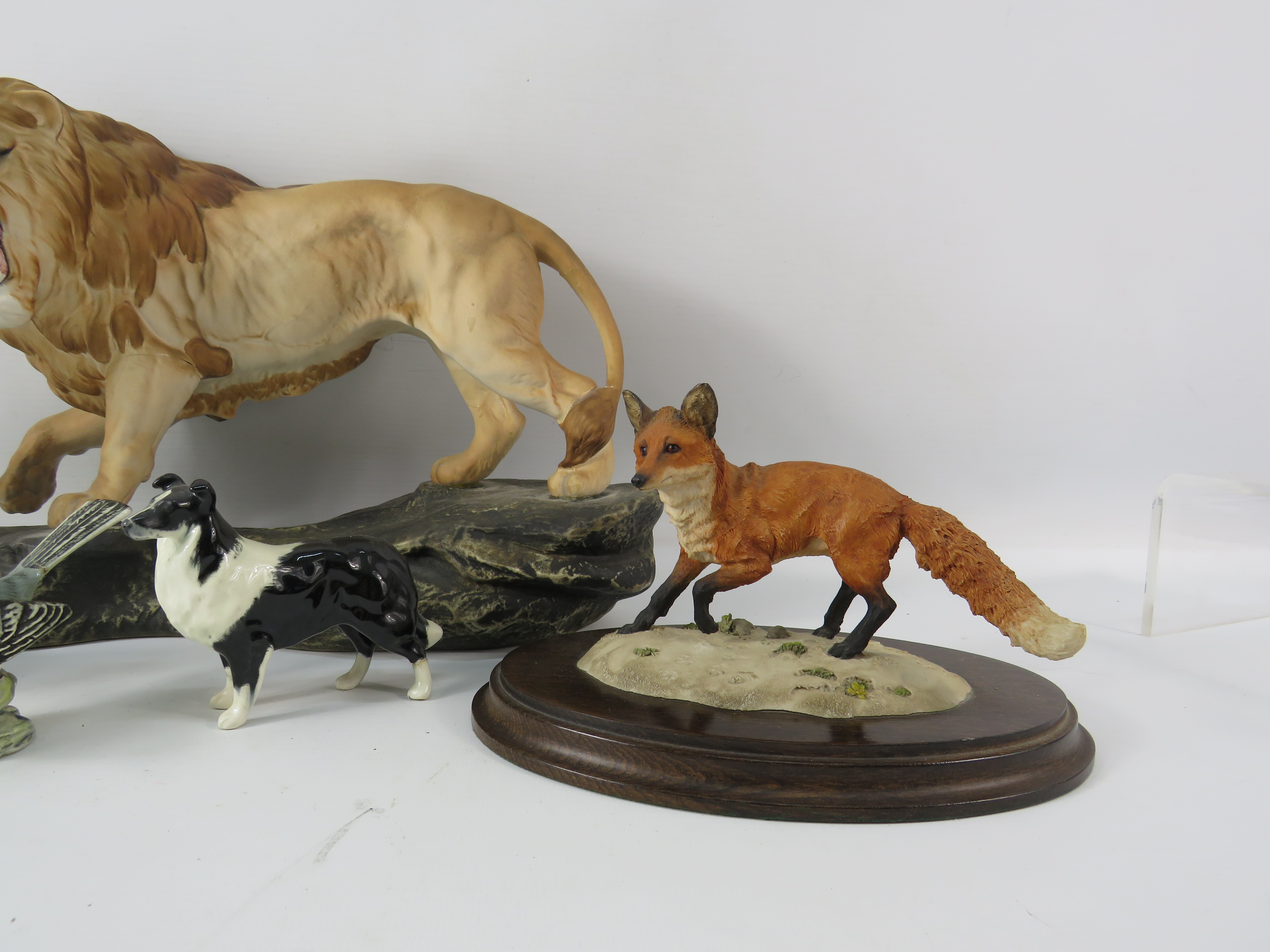 Various Beswick animal and bird figurines and a Royal Doulton Fox. (Lion, collie and grey wagtail - Image 3 of 7