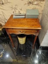 A satinwood side table the central frieze with a single drawer and brushing slide mounted on slender