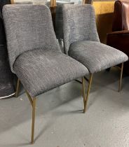 Pair Of Contemporary Dining Chairs This contemporary dining chair set features gold finish effect