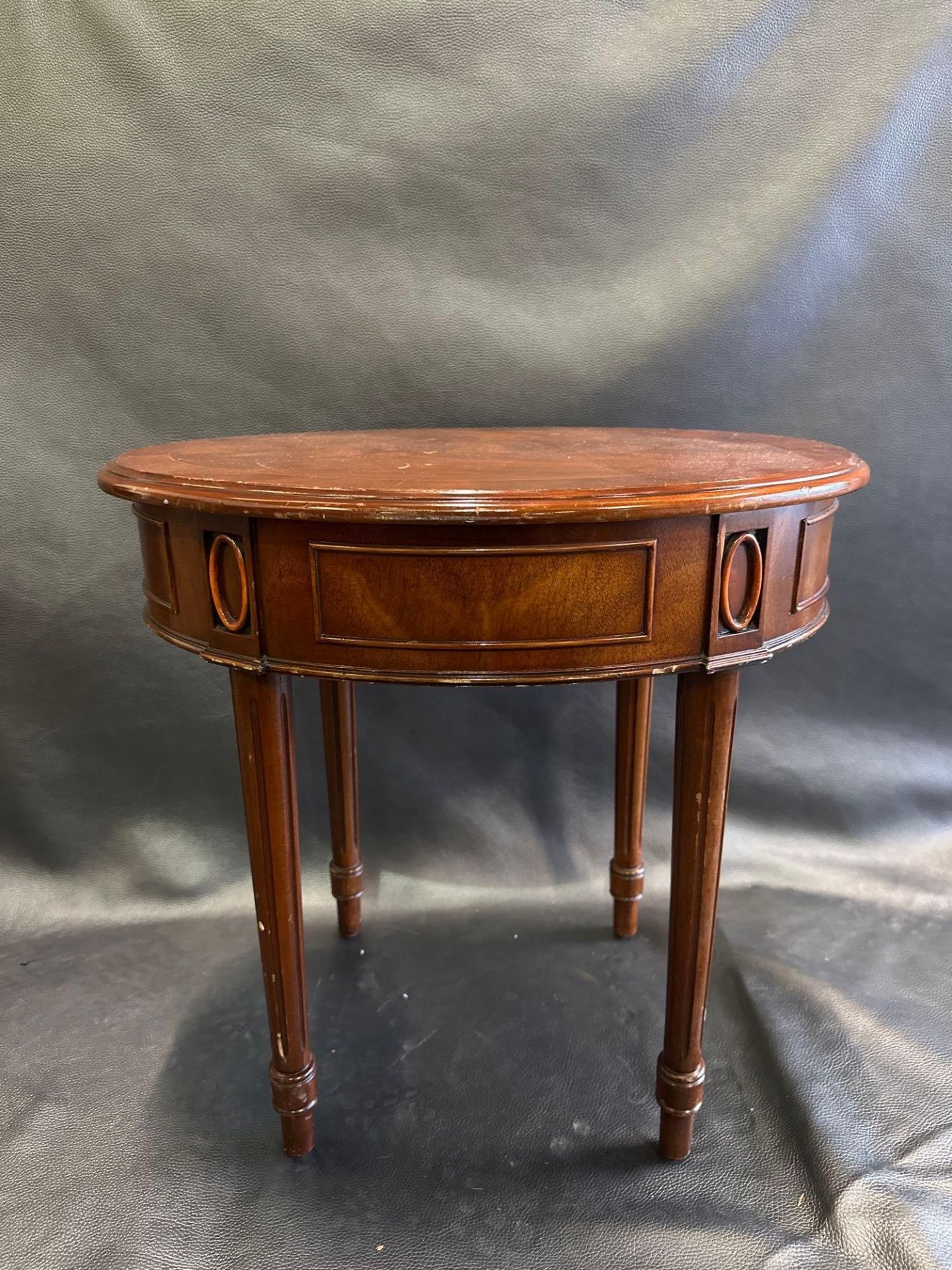 A Mahogany Ovoid Side Table The Freize Carved With Panels And Medallions Raised On Turned Fluted - Image 2 of 5
