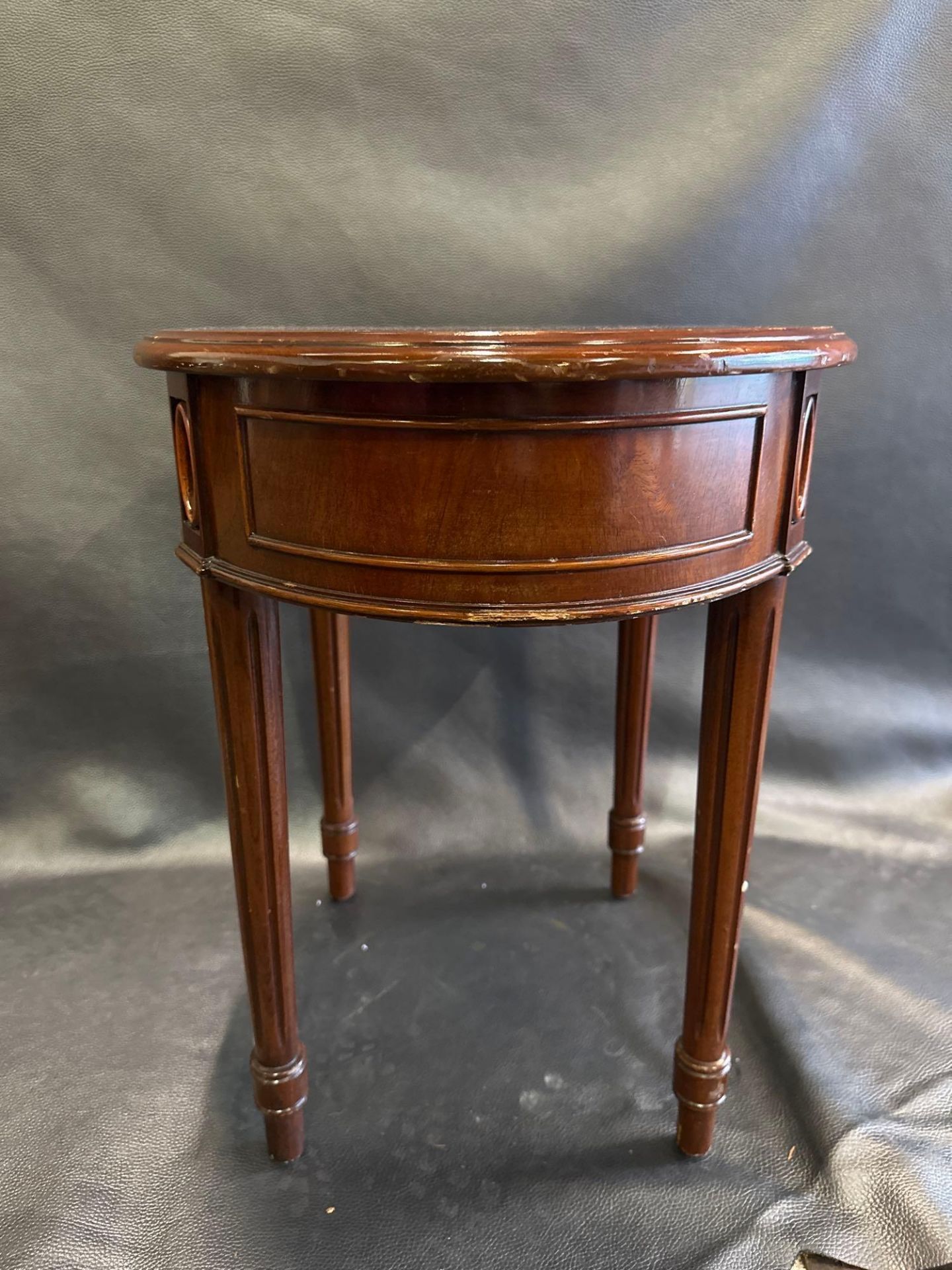 A Mahogany Ovoid Side Table The Freize Carved With Panels And Medallions Raised On Turned Fluted - Image 4 of 5