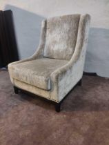 A Champagne Luxury Upholstered Relaxer Chair Sloping Arms With Overstuffed Sprung Back Rest And Seat