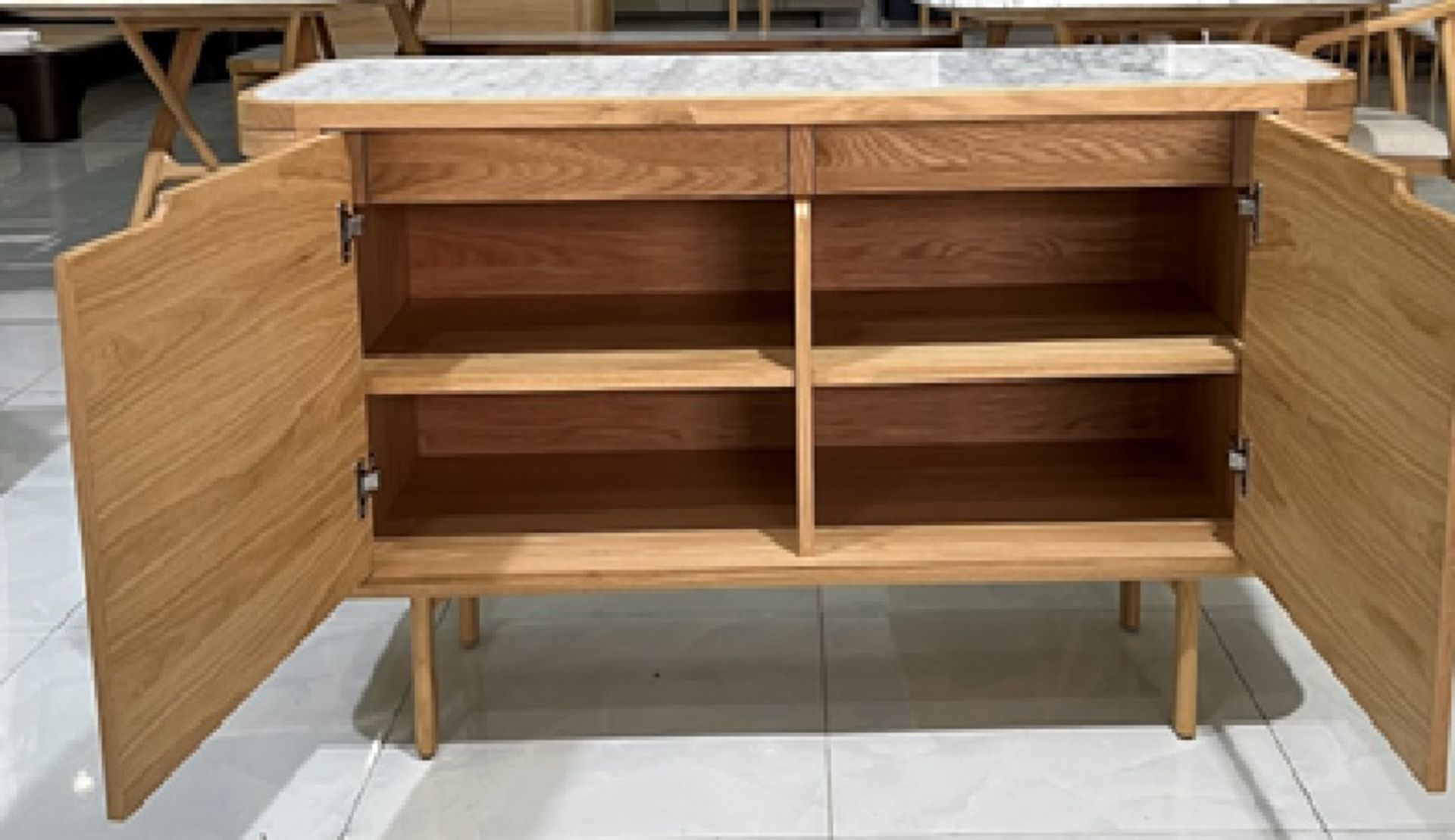 The Asher Sideboard combines a solid walnut frame with Italian Carrara marble to produce a - Image 2 of 2