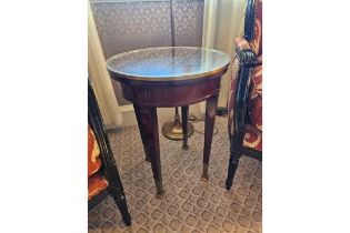 Circular Side Table With Antiqued Plate Top And Brass Trim Mounted On Tapering Legs With Brass