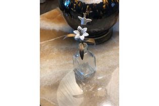 A Glass And Porcelain Perfume Bottle