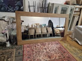 This massive Halo Marbello mirror features a classic farmhouse style with a natural rustic wood
