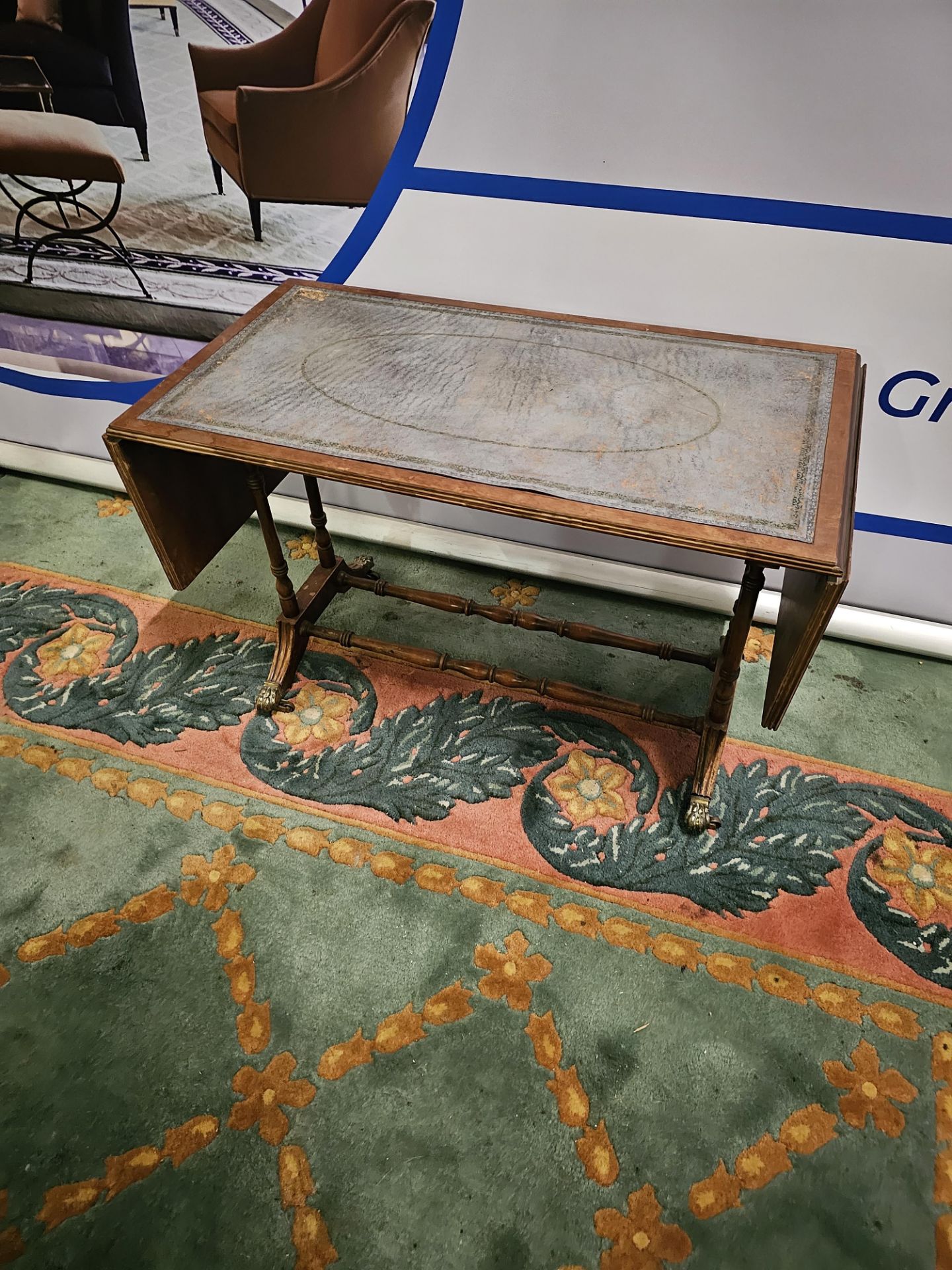 Elegant Pembroke Table with Blue Leather Inlay  Introducing the quintessence of craftsmanship and