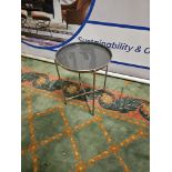 Gallery Contemporary Round Metal Tray Table Dimensions: 43cm x 55cm Finish: Silver and Grey