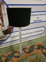 Acrylic and chrome floor lamp in round sections complete with smooth black shade 146cm high