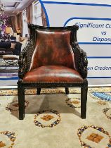 A Ebonised Fauteuil In French Empire Style. The Moulded Curved Toprails Above Padded And Scooped