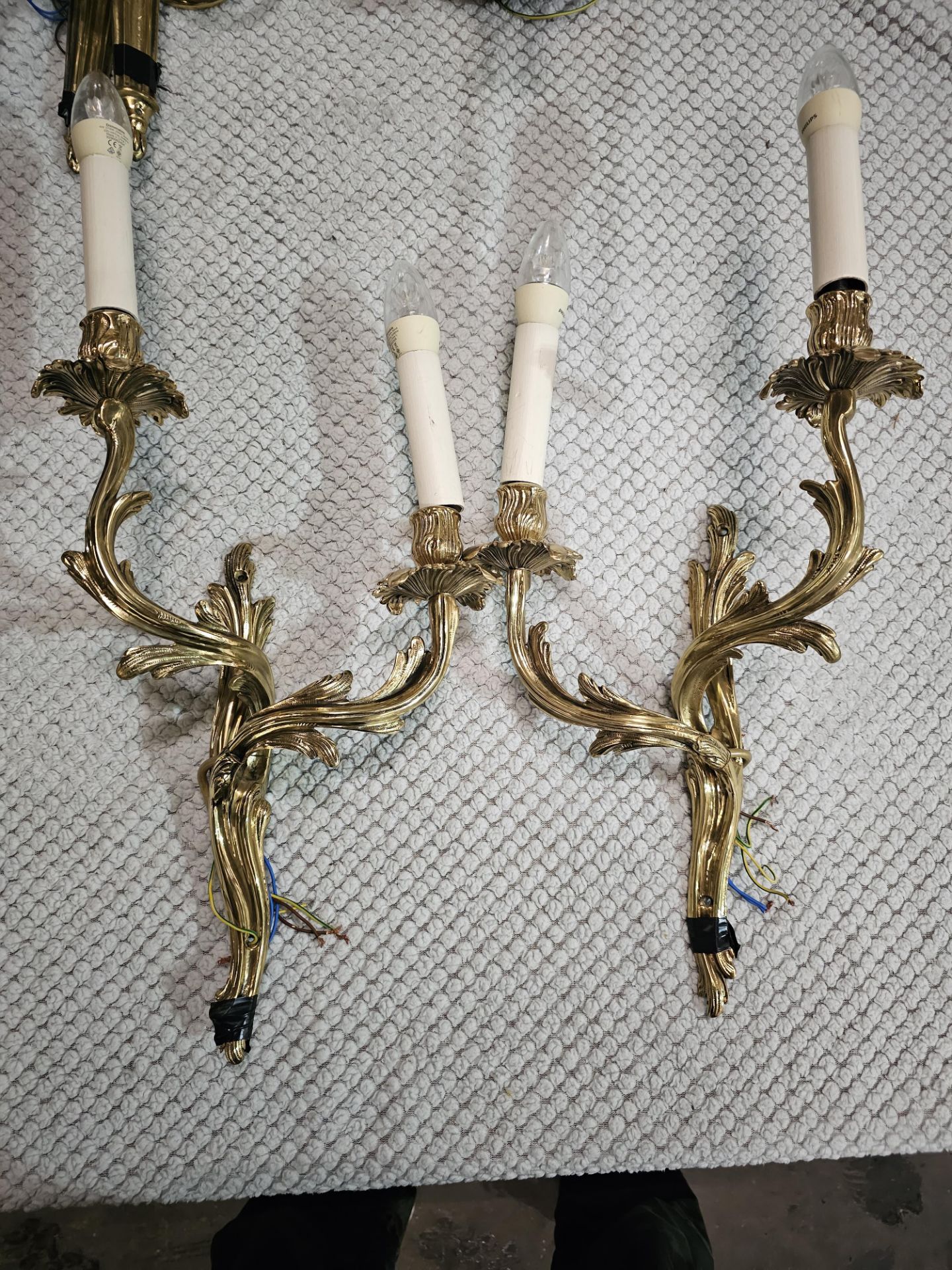 A Pair Of Louis XV Style Wall Appliques In Gilt Bronze With Two Candles Agrafe Decor On Which Are