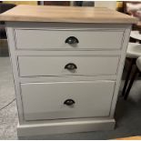 Kitchen Cabinet With its oak top, this freestanding kitchen storage unit features 3 useful