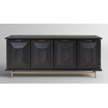 Black American Oak Draper Sideboard. This statement sideboard has a bronzed metal accent handle