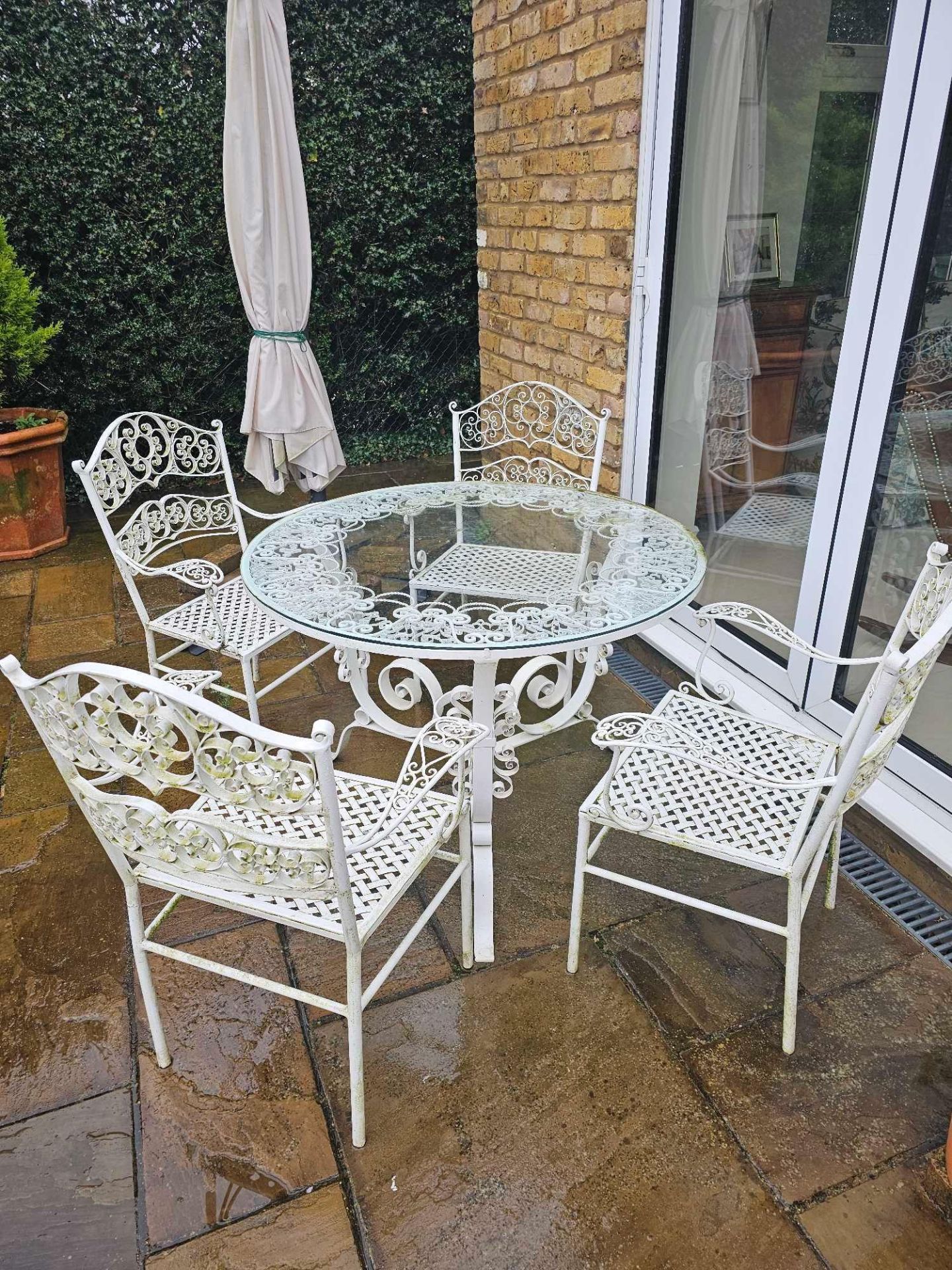 A Wrought Iron Painted White Glass Topped Garden Table Complete With 4 Chairs And A Parasol With - Image 2 of 6