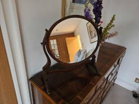 A Victorian Toilet Mirror Mahogany Oval Mirror, The Shaped Struts Supported On A Trestle End Base 50