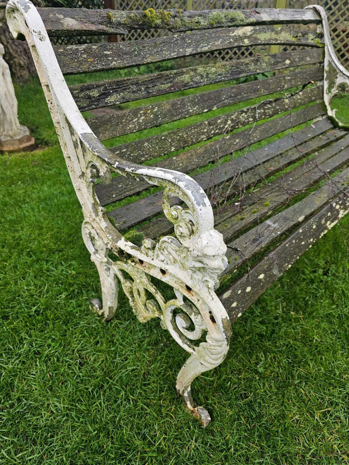 A Victorian Cast Iron Bench The Curved Wood Slats Raised On Monopodia Brackets - Image 2 of 3