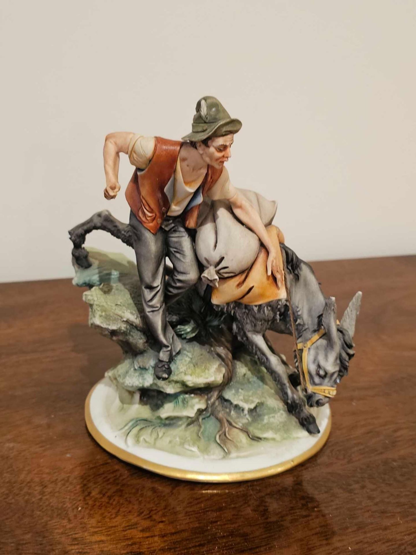 A Capodimonte Porcelain Italy Figurine Of A Man With A Donkey