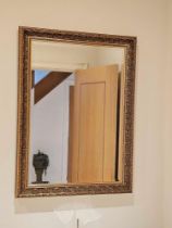 A Rectangular Composite Framed Bevelled Mirror 59 X 81cm