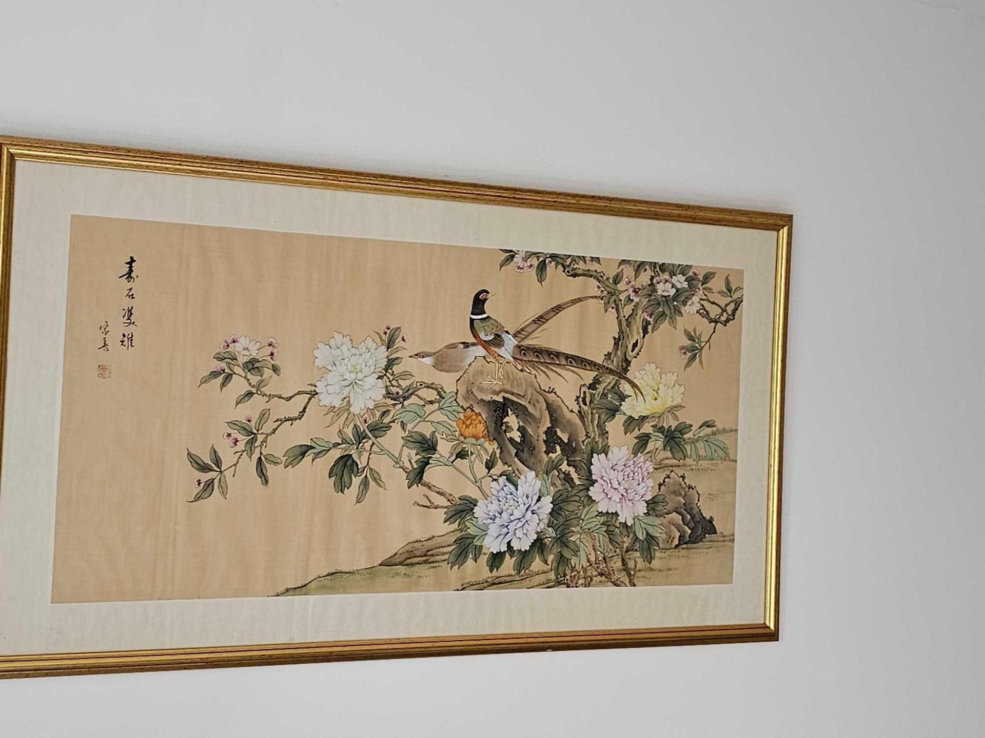 A Decorative Chinese Watercolour On Silk Of Two Exotic Birds Upon Rockwork, Flanked By Peony Blooms,