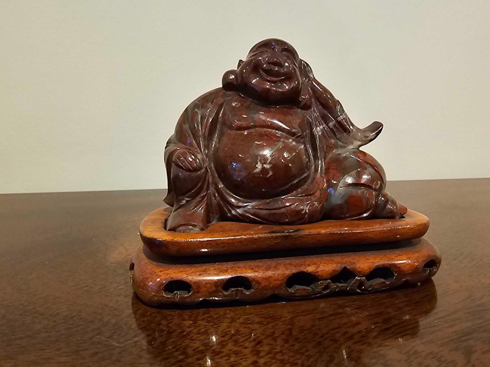 A Chinese Carved Soapstone Figure Of Hotei Seated On Rosewood Plinth 10cm Overall - Image 2 of 3