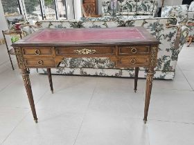 A Louis XVI Style Bureau Plat The Rectangular Crossbanded Top Leather Inset Above A Central Frieze