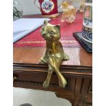 A Brass Decorative Figurine Of A Cat Sitting