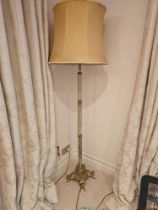 An Edwardian Onyx And Gilt Brass Standard Lamp The Column Form Raised On A Profusely Decorated Brass