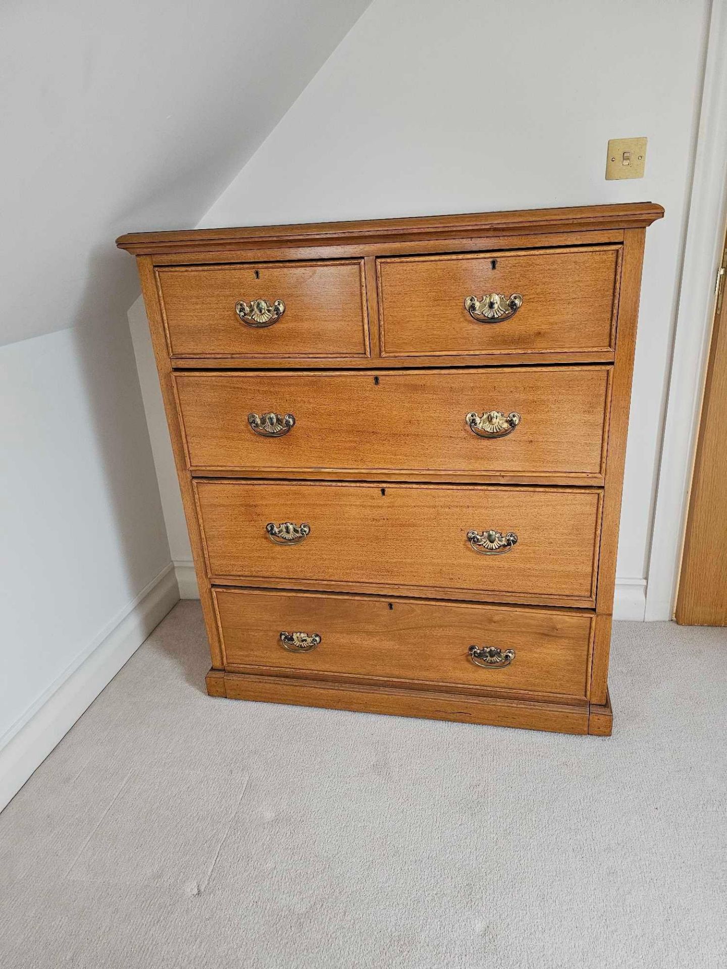 A George III Style Walnut Chest Of Drawers Two Short Over Three Long Cockbeaded Drawers On Plinth