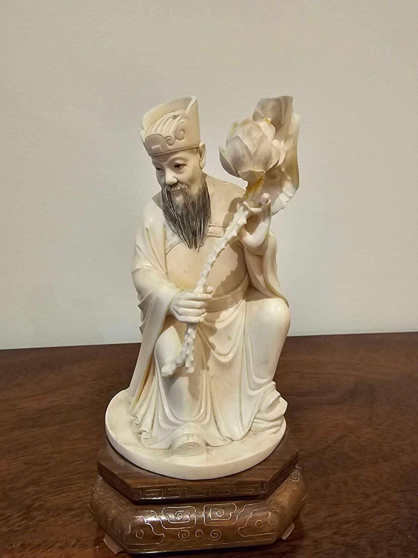 Early 20th C. A Decorative Chinese Ivory Figure Of An Immortal Modelled Seated With A Oversized - Image 2 of 5