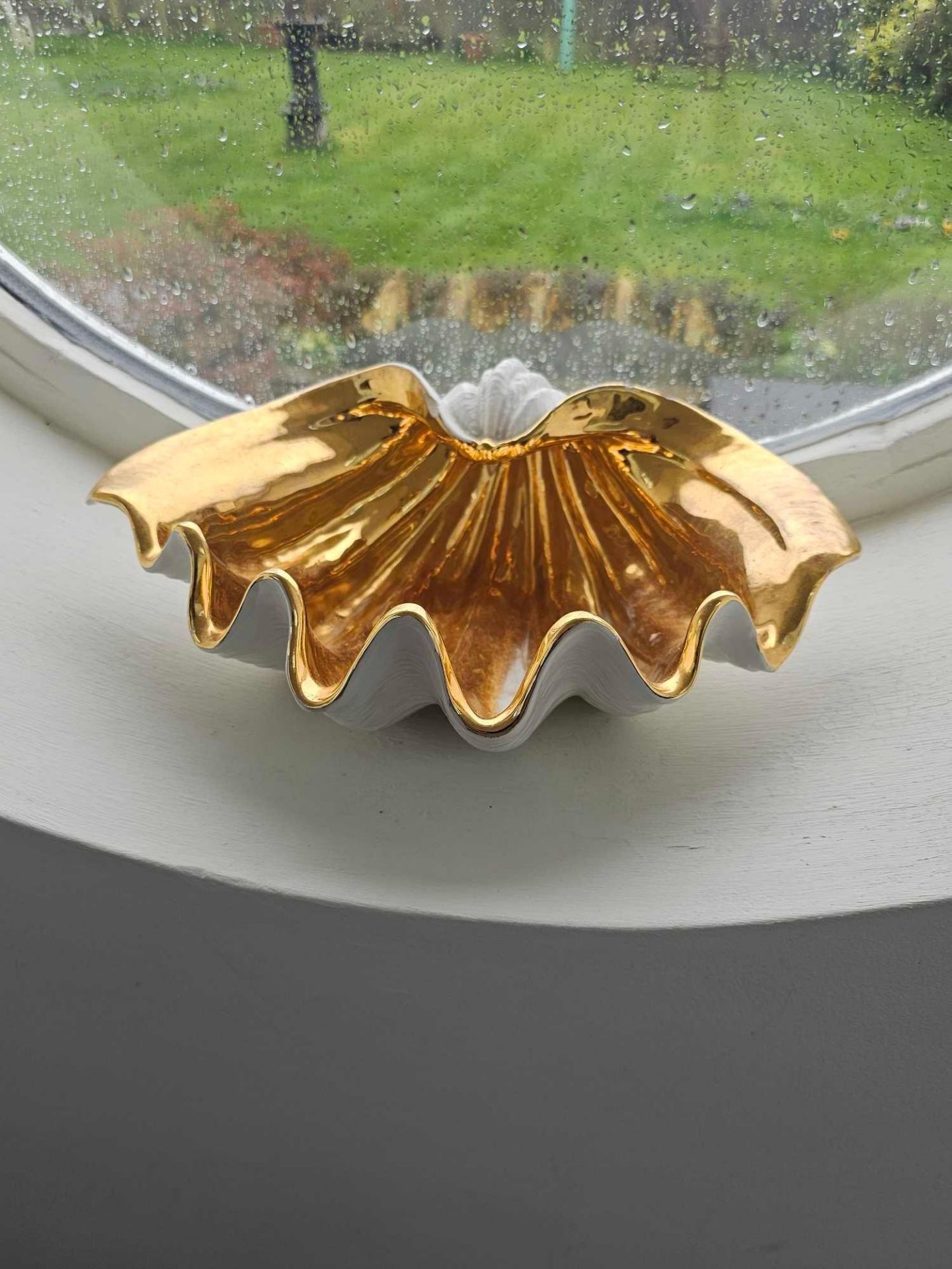 A Fine Porcelain Clam Neptune Decorative Objet Textured Finish And Gold Gilded