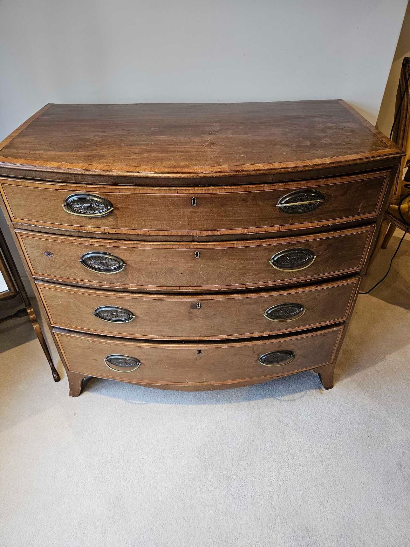 A George III Mahogany And Satinwood Banded Bowfront Chest With Four Graduating Drawers On Splayed - Bild 7 aus 7