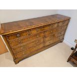 A George III Style Walnut Banded Nine Drawer Bank Of Drawers The Canted Rectangular Top Over An