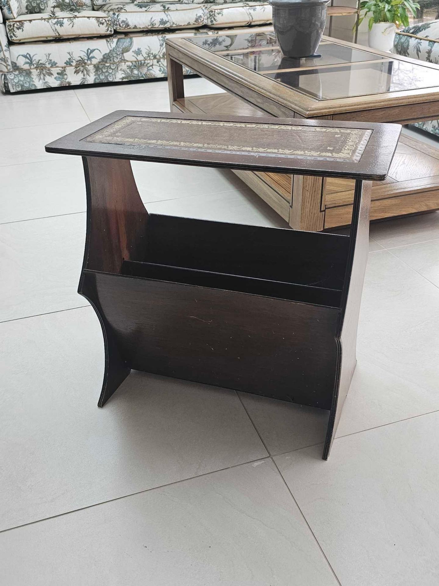 A Mahogany Magazine Stand And Rack With Leather Inlay Top A Small Table With Shaped Sides And