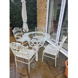 A Wrought Iron Painted White Glass Topped Garden Table Complete With 4 Chairs And A Parasol With