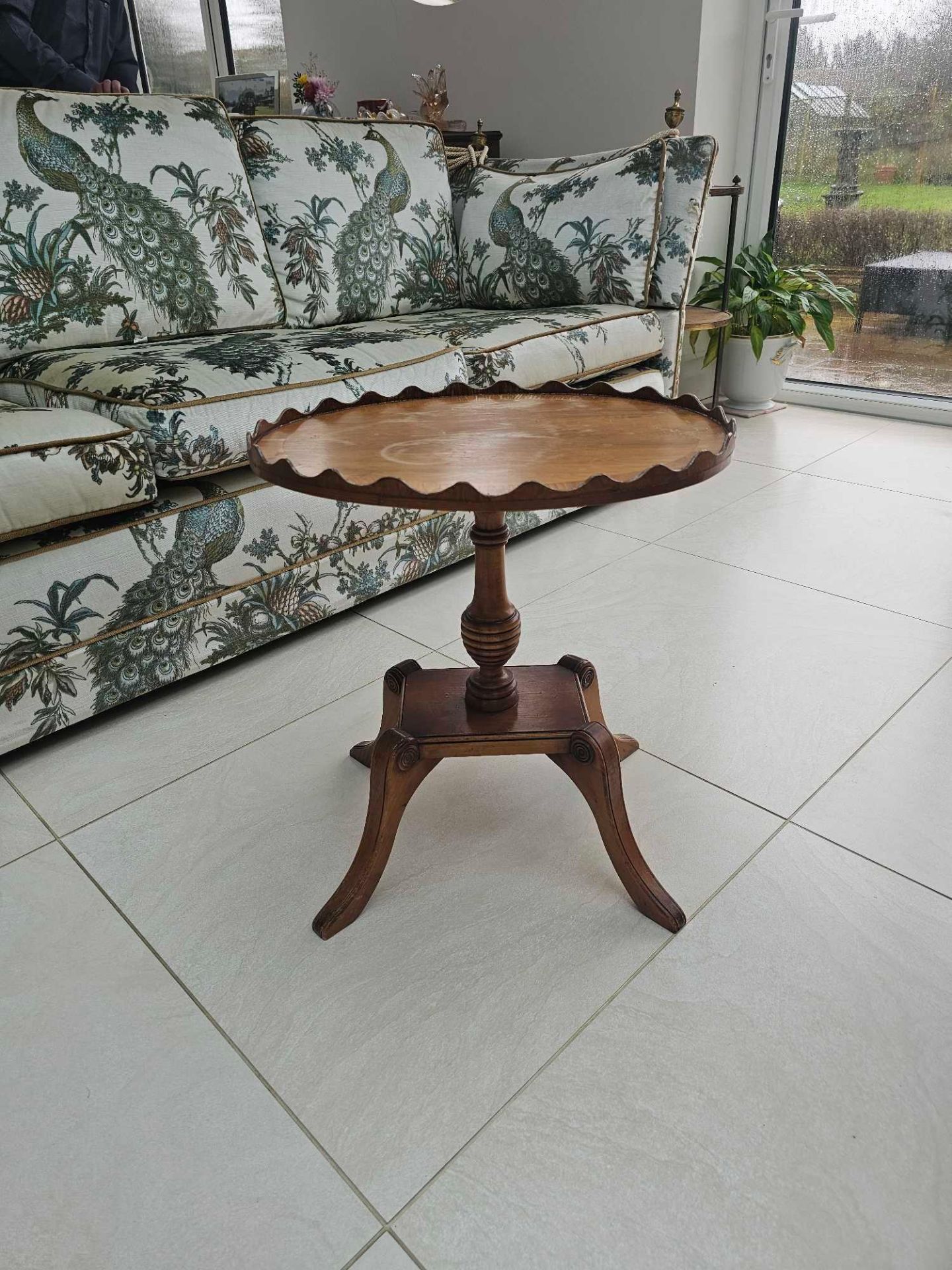 Bevan Funnell Reprodux Oval Mahogany Pedestal Wine Table In The Regency Style Having Shaped Wooden