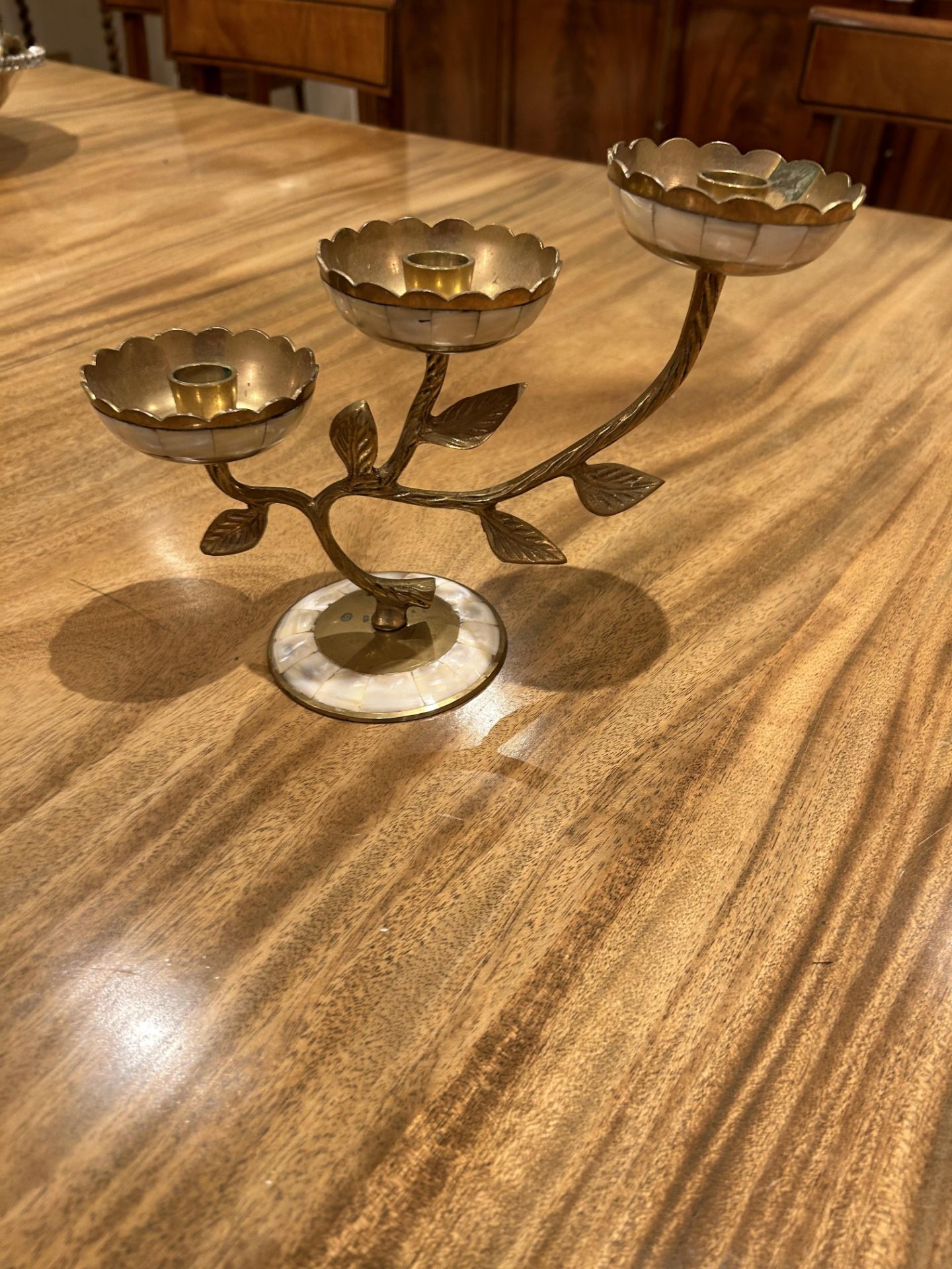 A Brass and Mother Of Pearl Candelabra