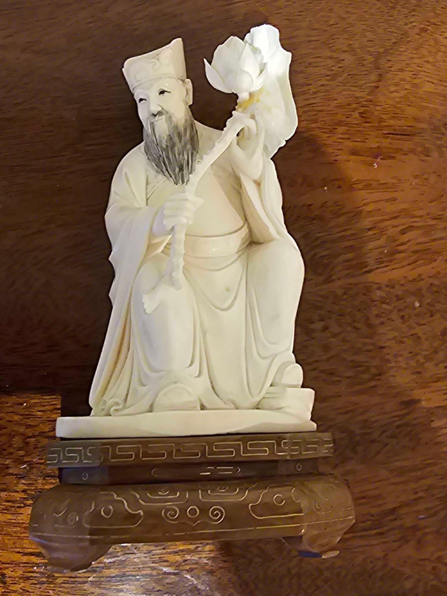 Early 20th C. A Decorative Chinese Ivory Figure Of An Immortal Modelled Seated With A Oversized - Image 5 of 5