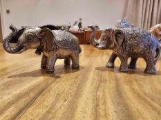 A Collection Of 2 X Metal Elephant Figurines As Per Photograph