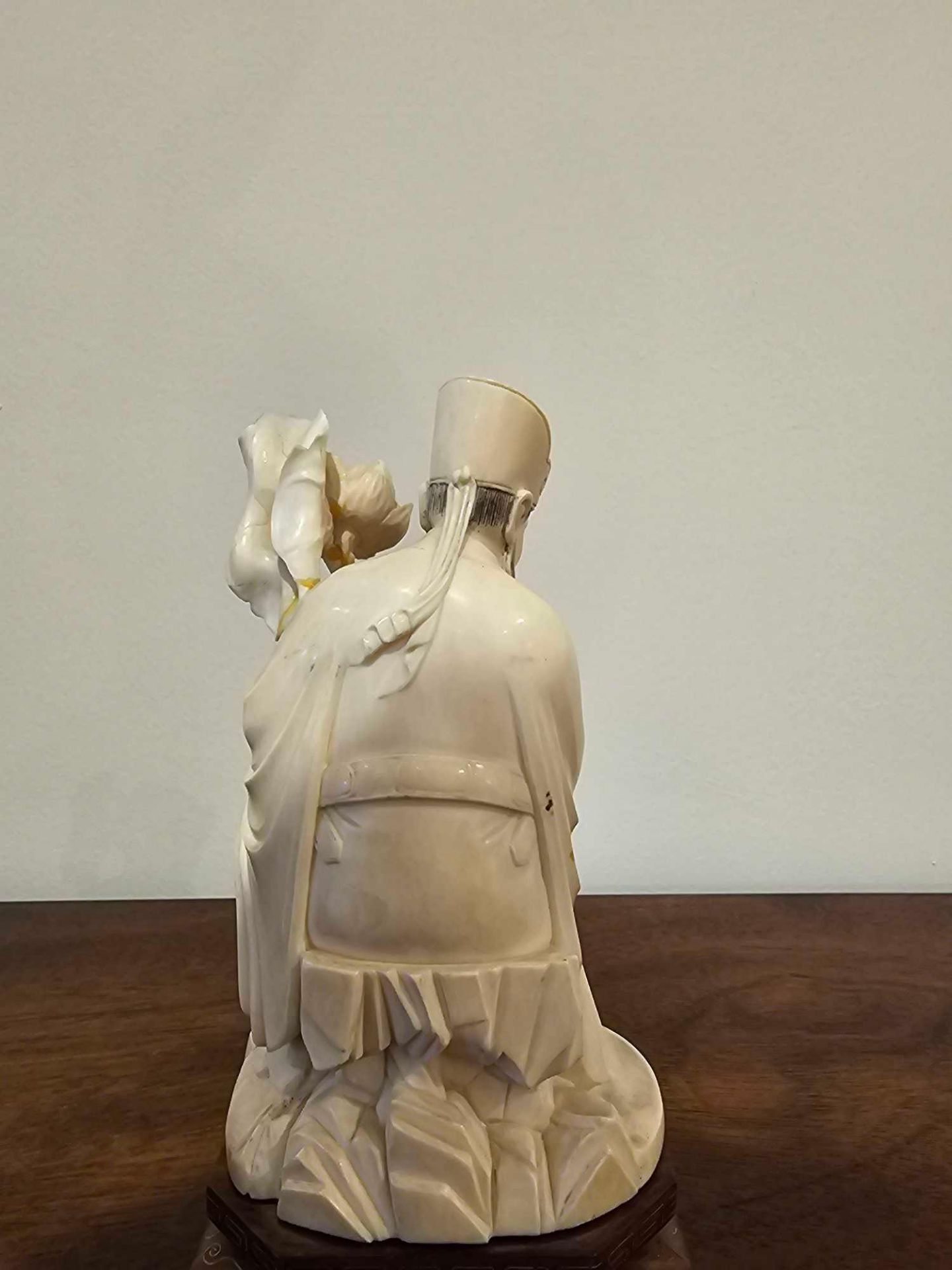 Early 20th C. A Decorative Chinese Ivory Figure Of An Immortal Modelled Seated With A Oversized - Image 4 of 5