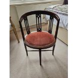 An Edwardian Mahogany Tub Chair A Low Easy Chair, With A Rounded Splat Panel Back, Padded Shaped