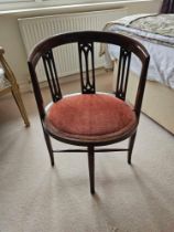 An Edwardian Mahogany Tub Chair A Low Easy Chair, With A Rounded Splat Panel Back, Padded Shaped