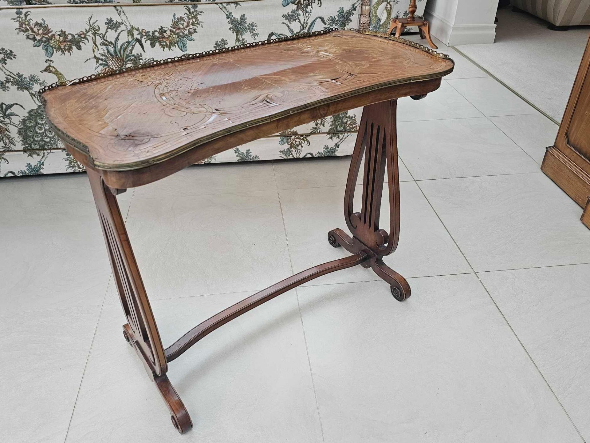 A Louis XVI Style Kingswood And Tulipwood Banded Side Table The Shaped Decorated Top With A