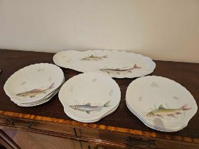 A Porcelaine De Sologne France A Set Of 12 X Scalloped Fish Plates And A Platter 55 X 24cm