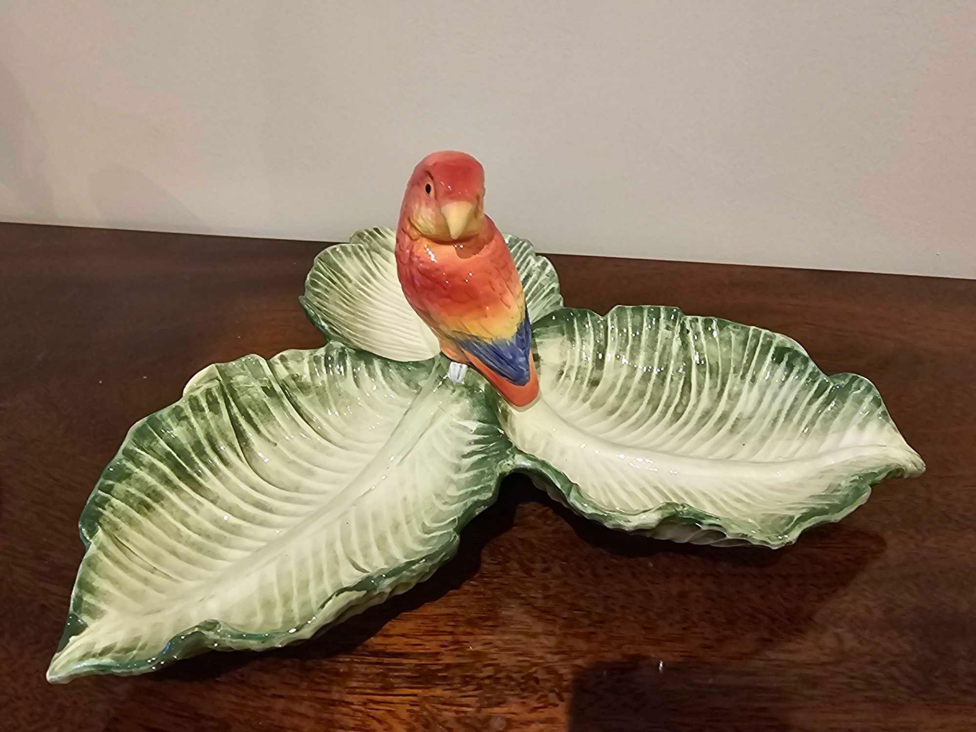 A Fitz Floyd Style Porcelain Dried Fruit Bowl Depicting A Parrot On A Trio Of Shallow Leaf Conjoined - Image 2 of 3