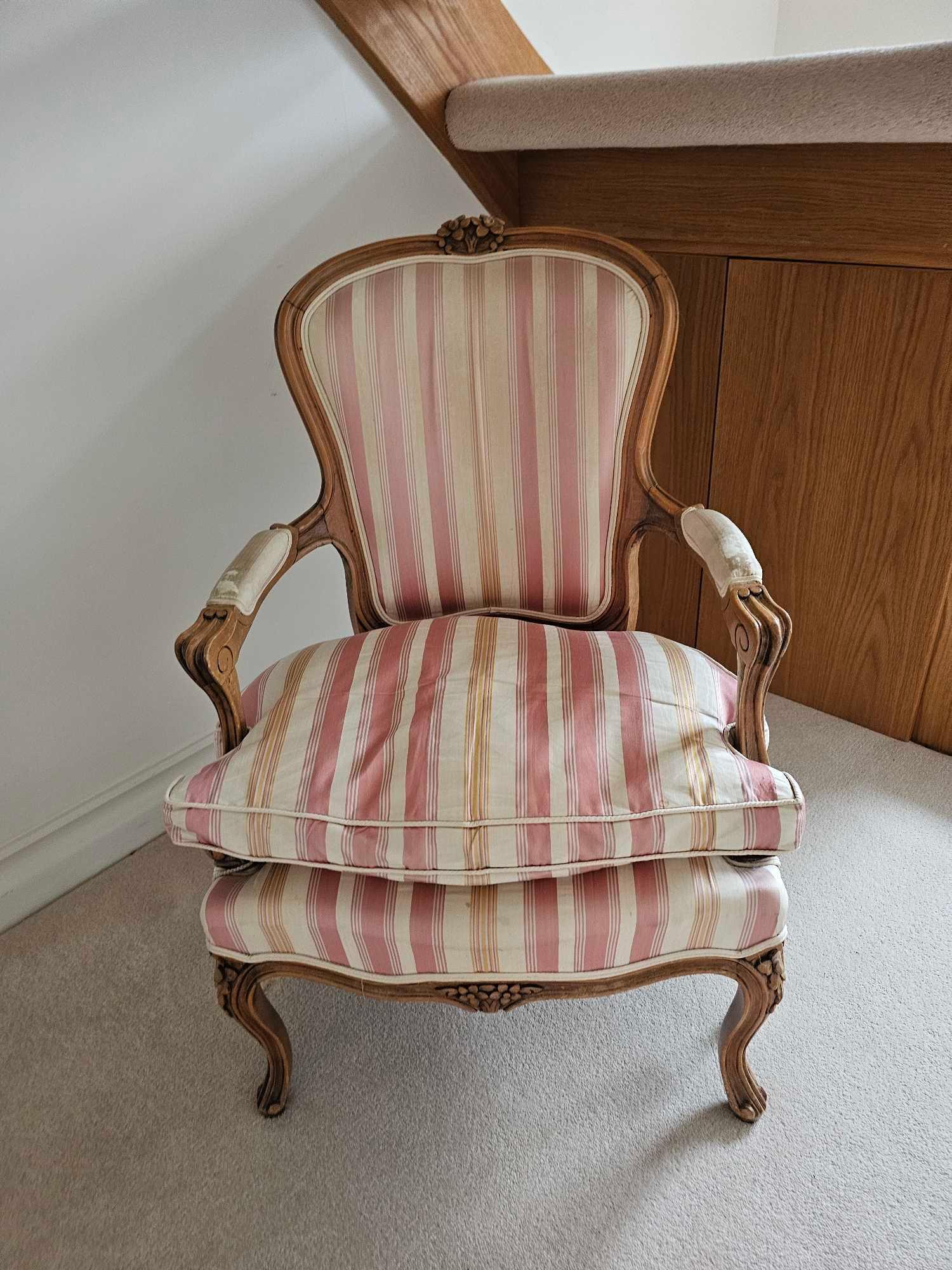 A Louis XV Style Beechwood Fauteuil The Shaped Rectangular Back With Floral Cresting, Striped