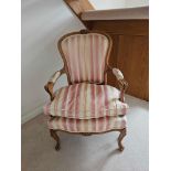 A Louis XV Style Beechwood Fauteuil The Shaped Rectangular Back With Floral Cresting, Striped