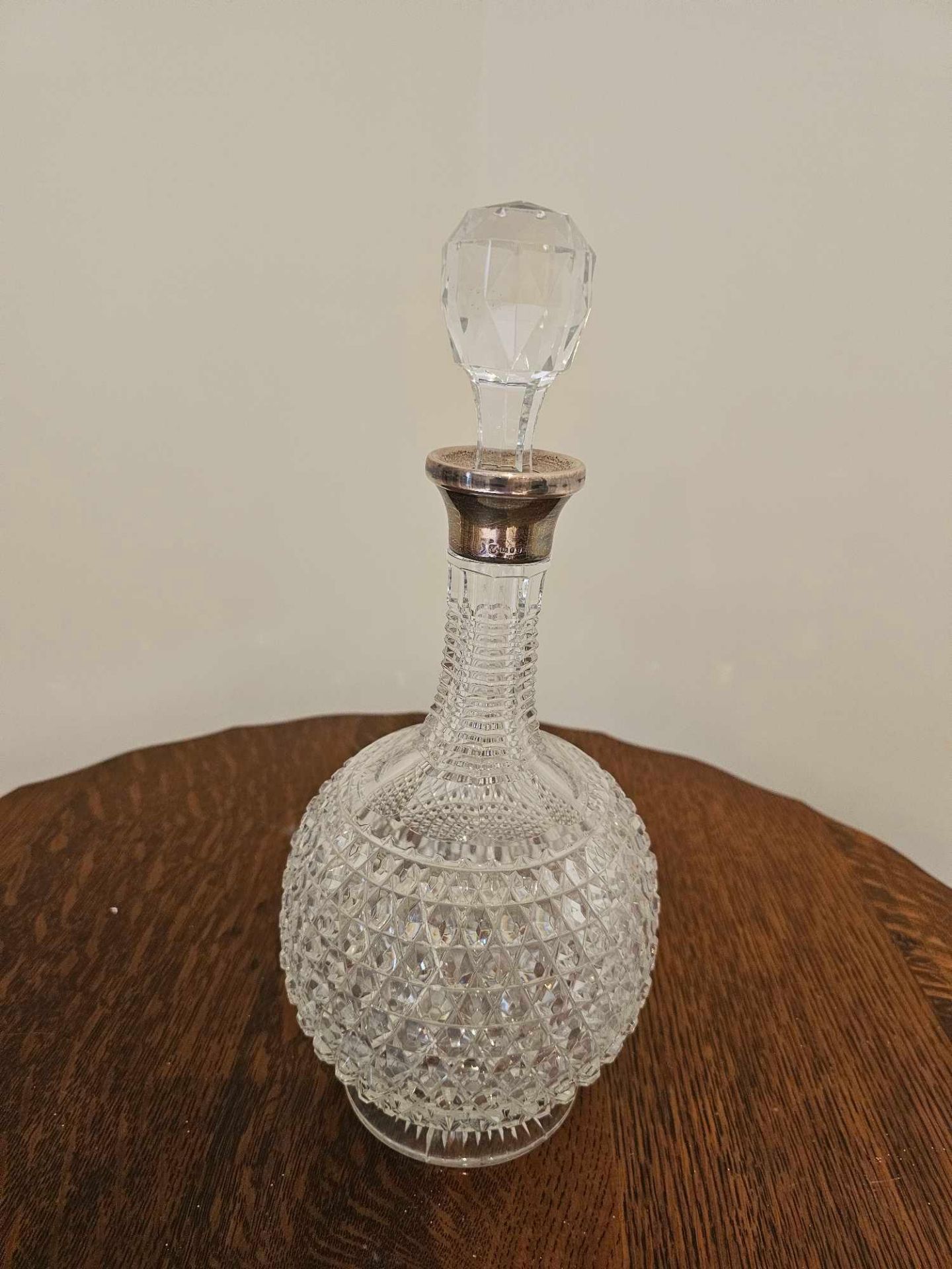 A Glass Cut Decanter With Stopper Of Bottle Form With Silver Assay Marked Collar London 1973 32cm - Image 4 of 10