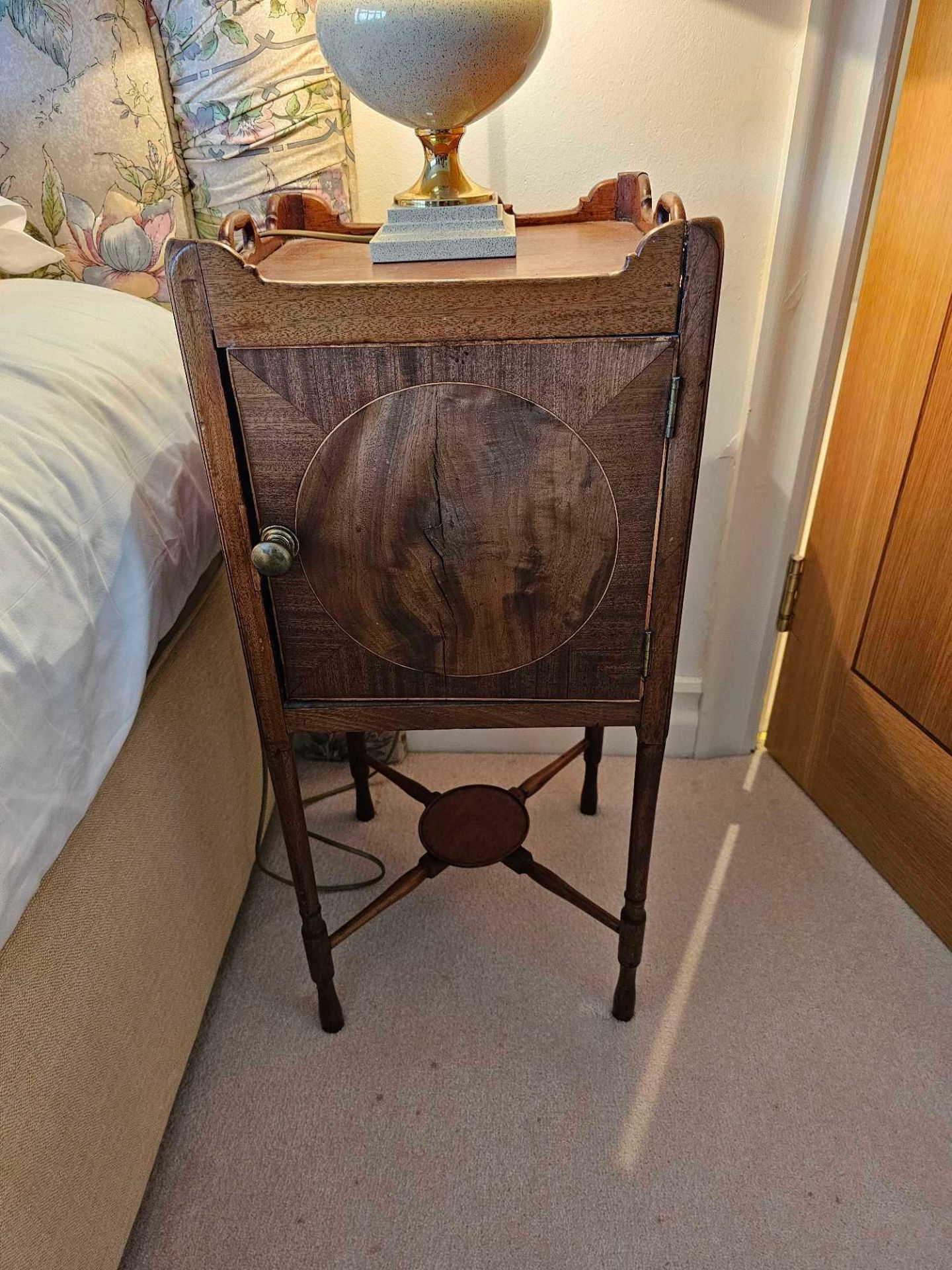 A George III Mahogany Bedside Cabinet The Three Quarter Pierced Gallery Tray Top Incorporating
